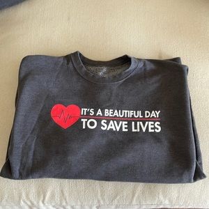 Greys Anatomy “it’s a great day to save lives” shirt.